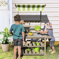 potting bench with two kids