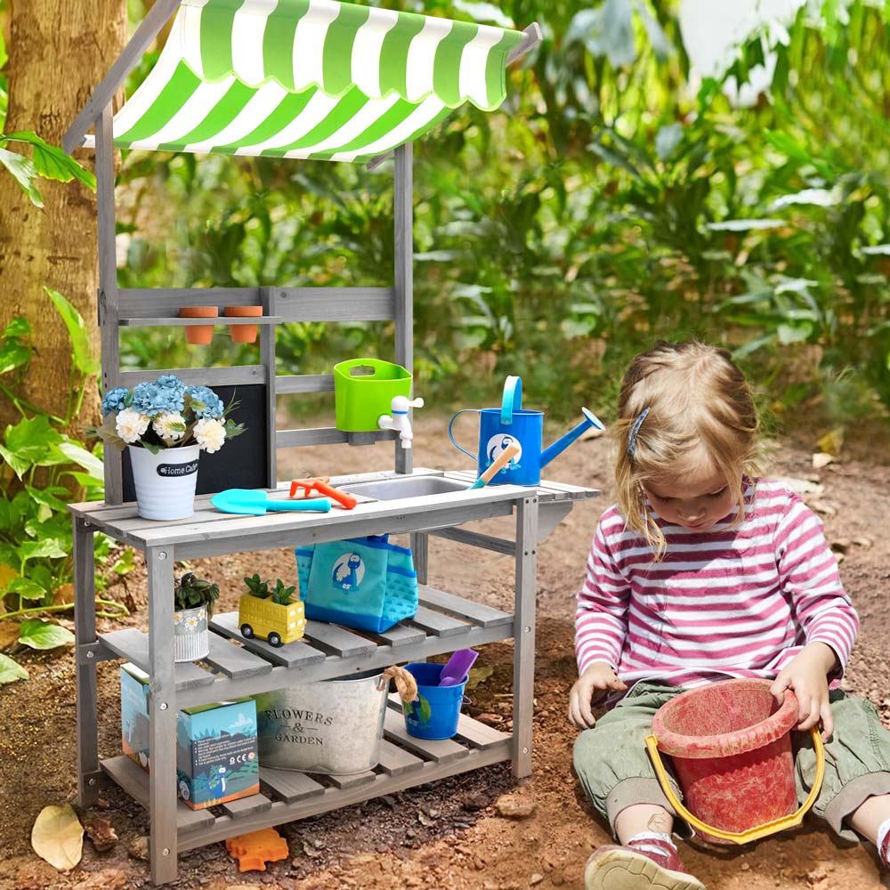 kids outdoor potting table in the backyard